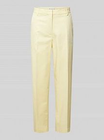 Chinosy o kroju slim fit z mieszanki bawełny i lyocellu Tommy Hilfiger żółte EAN WW0WW40504