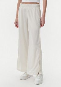 Spodnie dresowe Puma beżowe damskie 