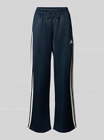 Spodnie dresowe z elastycznym ściągaczem adidas Sportswear niebieskie damskie EAN JW0534