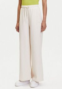 Spodnie dresowe Puma beżowe damskie 