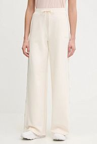 Spodnie dresowe Guess  beżowe damskie V5BB12.KCX22