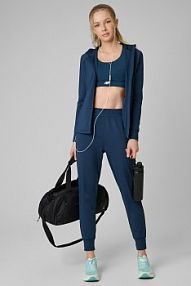 Spodnie dresowe turkusowe 4F damskie 4FRSS26TFTRF1493-46S