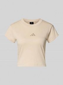 T-shirt o krótkim kroju z nadrukiem z logo adidas Sportswear beżowy damski EAN KD7721