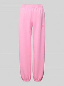 Spodnie dresowe krój loose fit z dodatkiem bawełny adidas Sportswear różowe damskie EAN KA7019